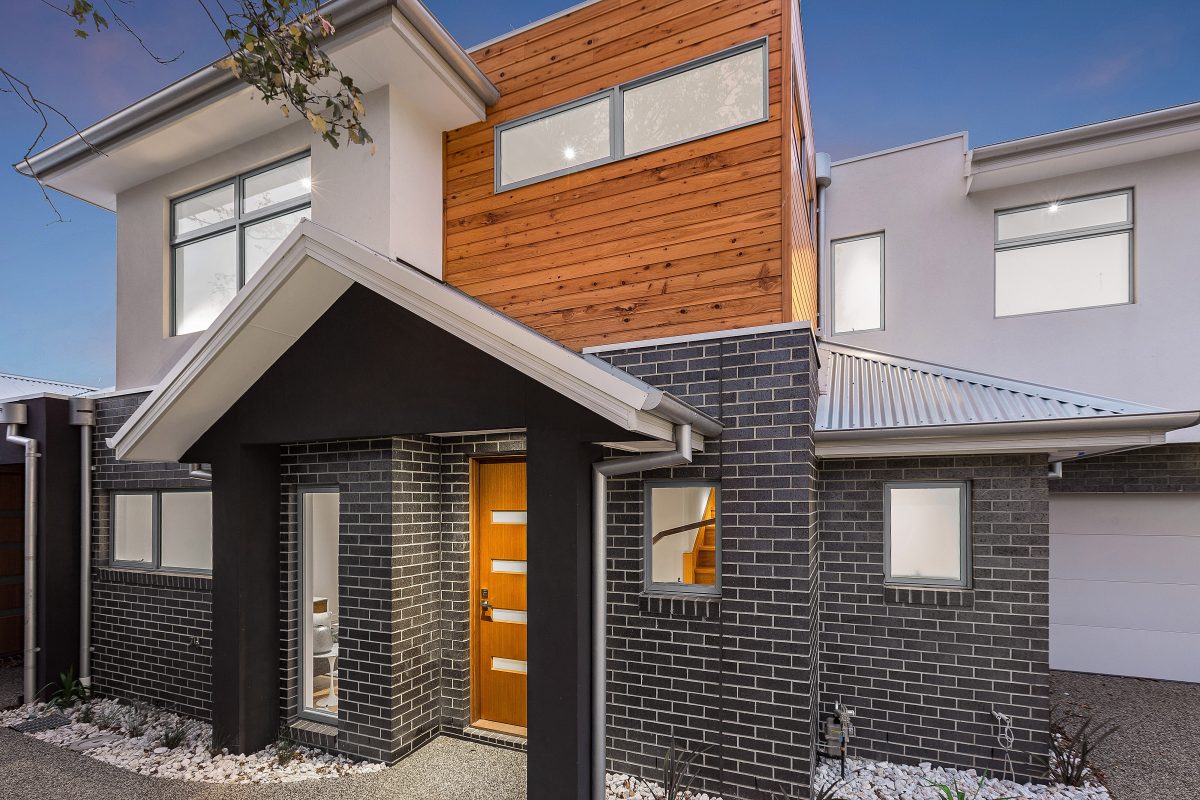 hardwood timber and dark grey brick unit